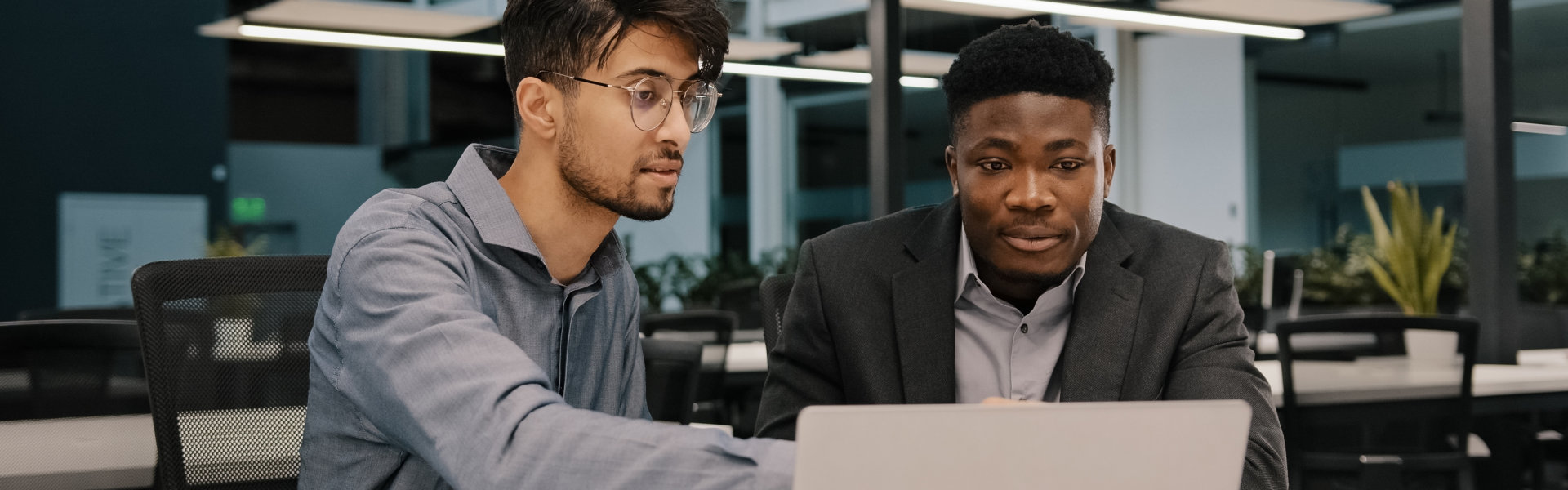 two men working together