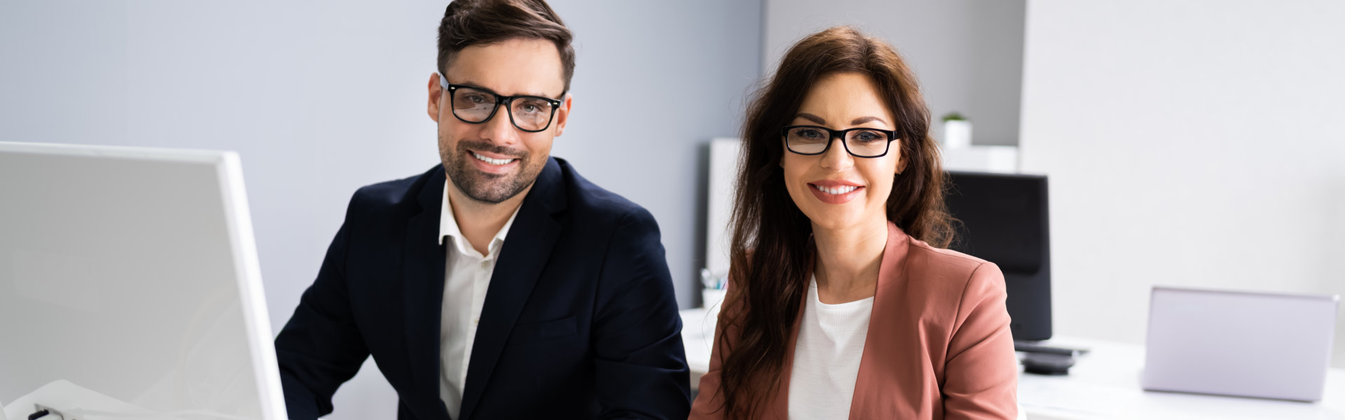 man and woman smiling